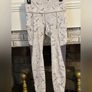 Athleta printed leggings with side pockets size s